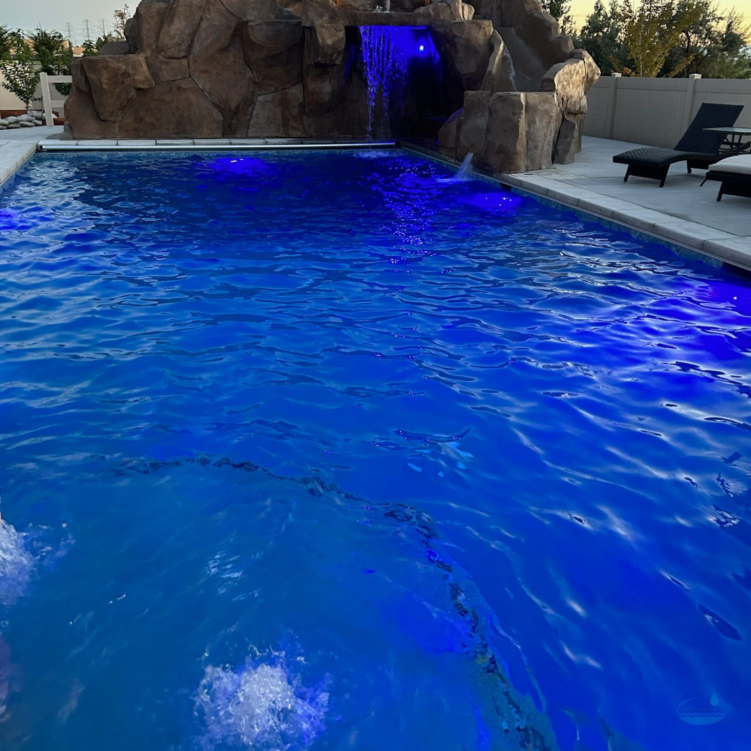 Deck Jets and Water Effects That Enhance Nighttime Use for A Pool and Spa